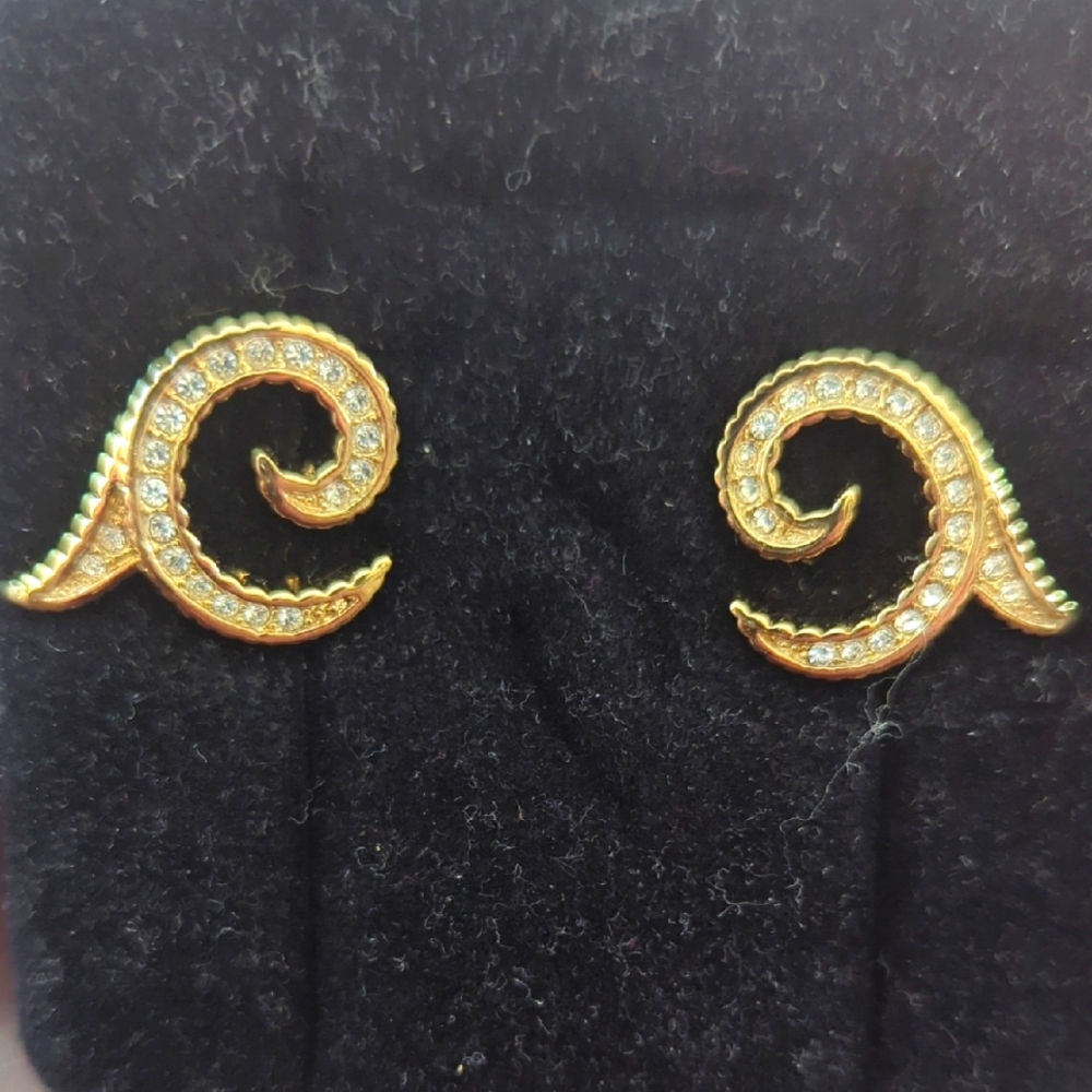 Elegant Gold Swirl Clip on Earrings